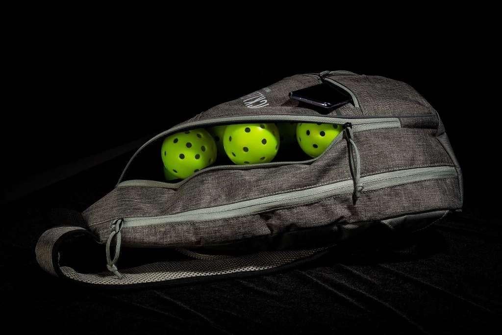 Franklin Sports Pickleball Bags - Pickleball Sling Bag Backpack for Gear + Equipment - Pickleball Bag for Men + Women - Holds Paddles, Pickleballs + Accessories - Official US Open Pickleball Bag